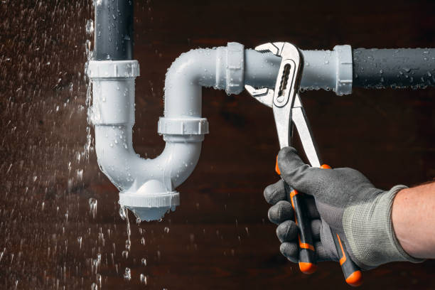 Professional Emergency Plumber technician working in Dravosburg, PA